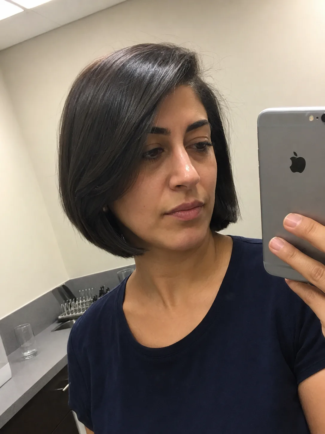sleek side part Korean bob with smooth ends and controlled shape