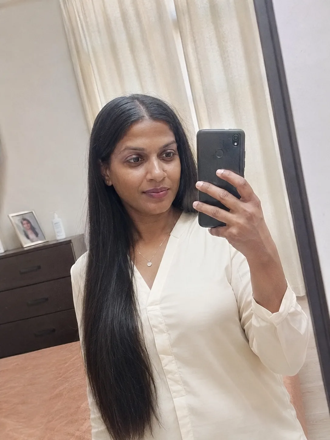very long straight black hair showing solid length and weight