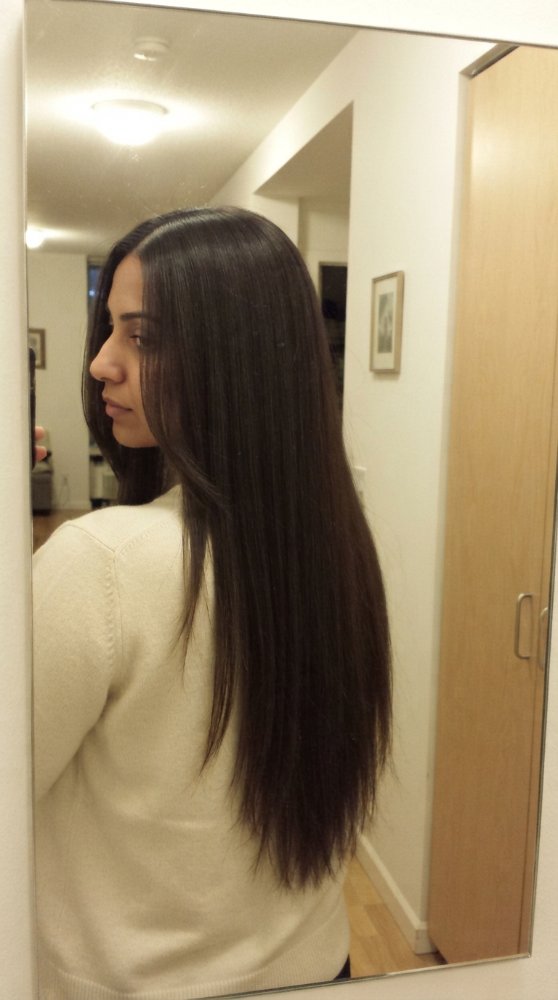 dark brown, long, and straight with a smooth texture