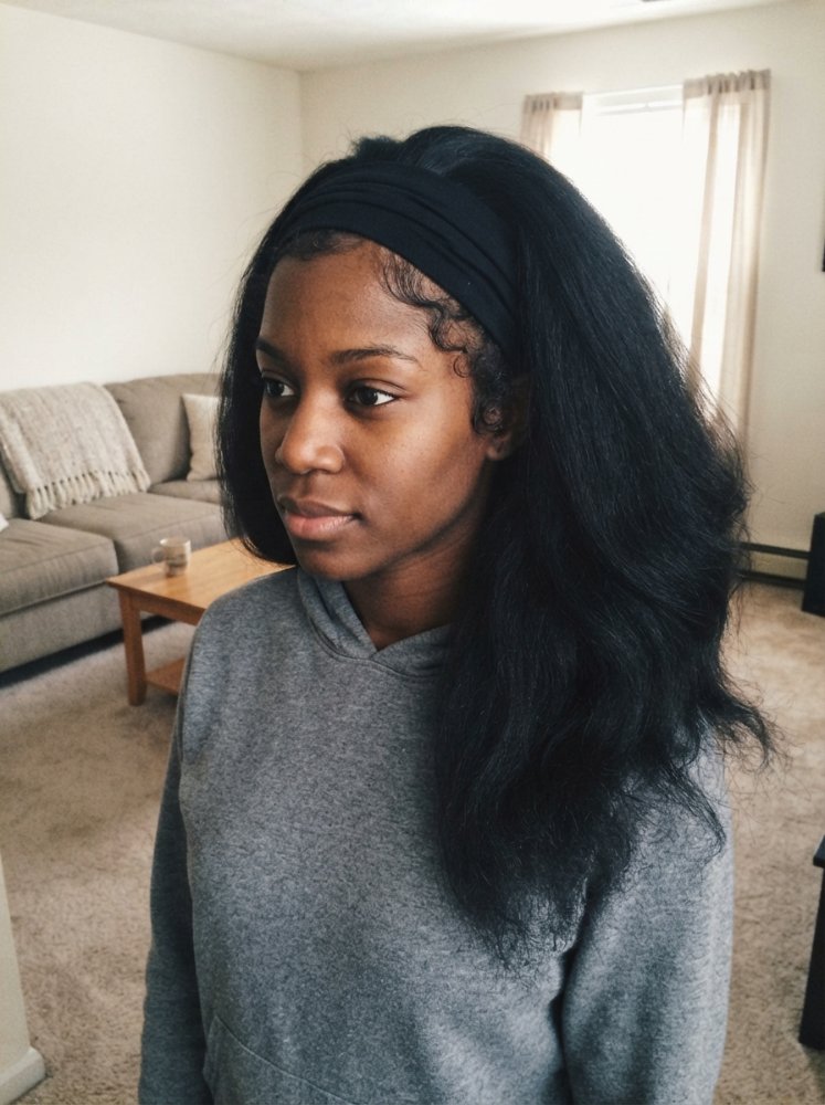 Dark brown mid-length smooth textured hairstyle.